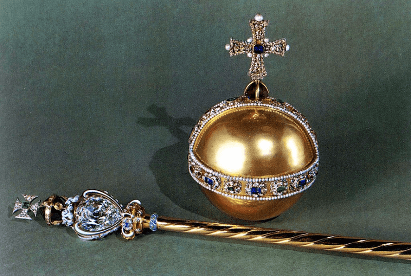 The Orb and Sceptre are important pieces of the coronation regalia. The Orb is a symbol of the monarch's rule over the world, while the Sceptre represents their authority over the church.